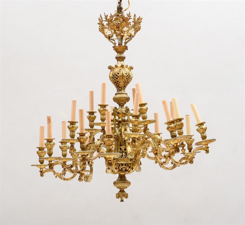 Appraisal: R GENCE STYLE GILT-BRONZE TWENTY-LIGHT CHANDELIER Fitted with a pierced