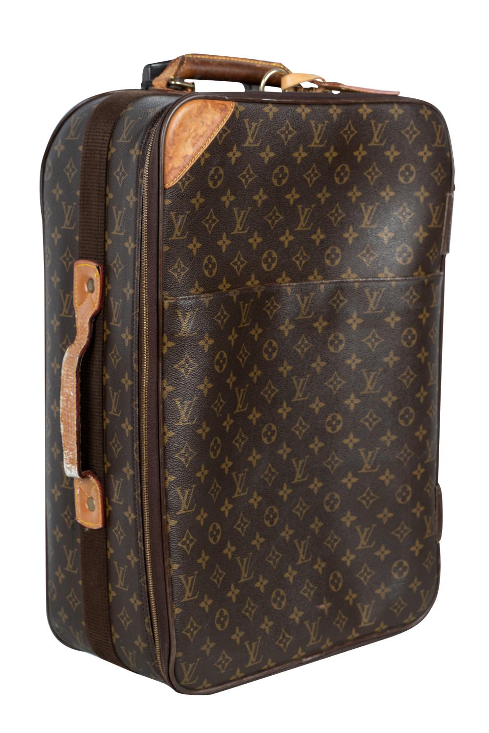 Appraisal: LOUIS VUITTON MONOGRAM ROLLING SUITCASECondition with scuffs scratches and discoloration