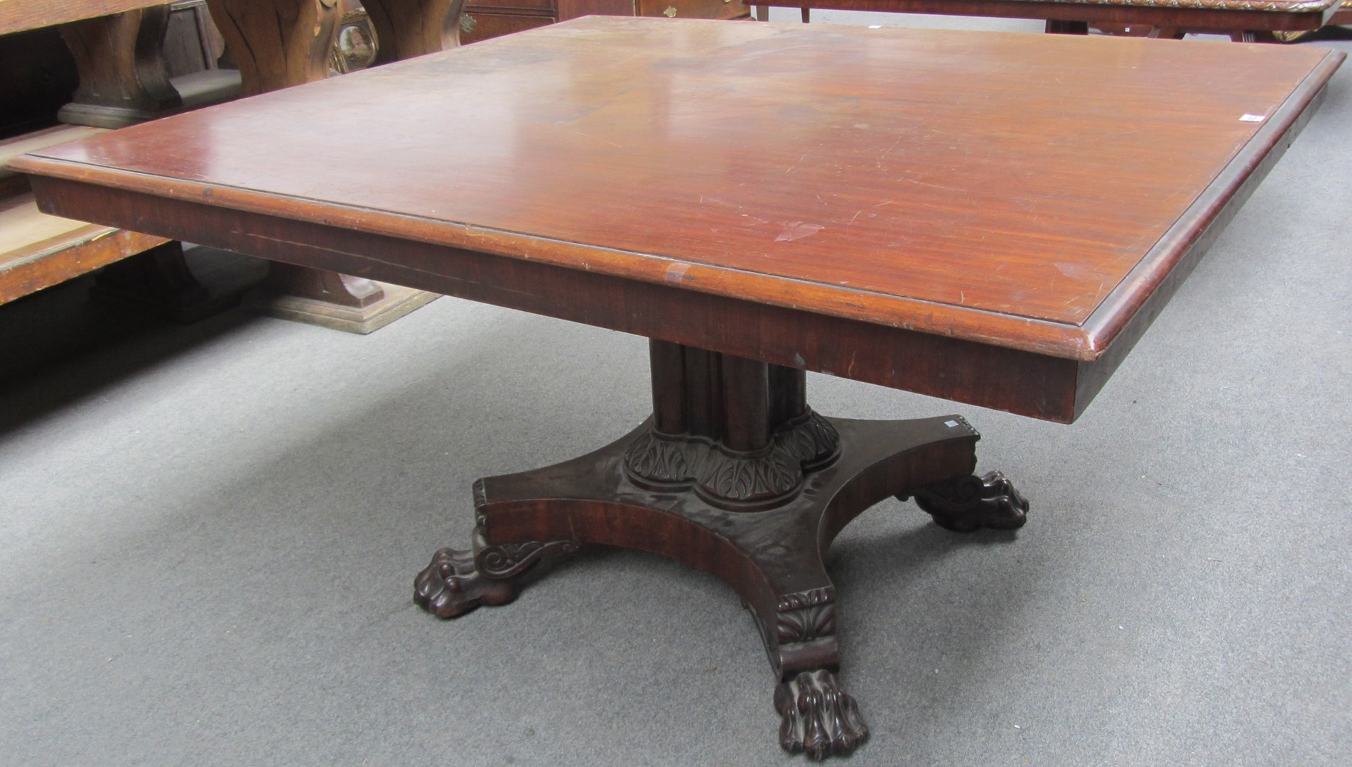 Appraisal: A George III mahogany rectangular snap top centre table on