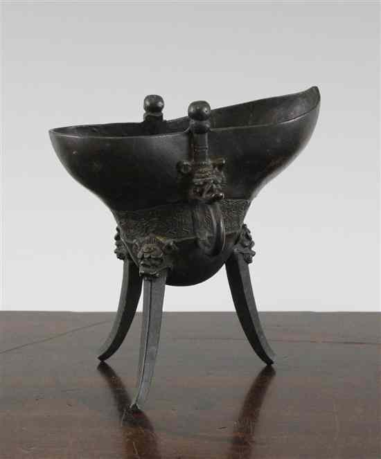 Appraisal: A Chinese bronze archaistic ritual vessel jue Qing Dynasty carved