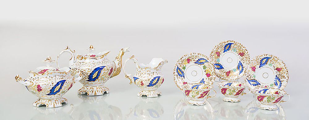 Appraisal: Paris Porcelain Gilt-Decorated Part Tea Service Comprising A teapot and