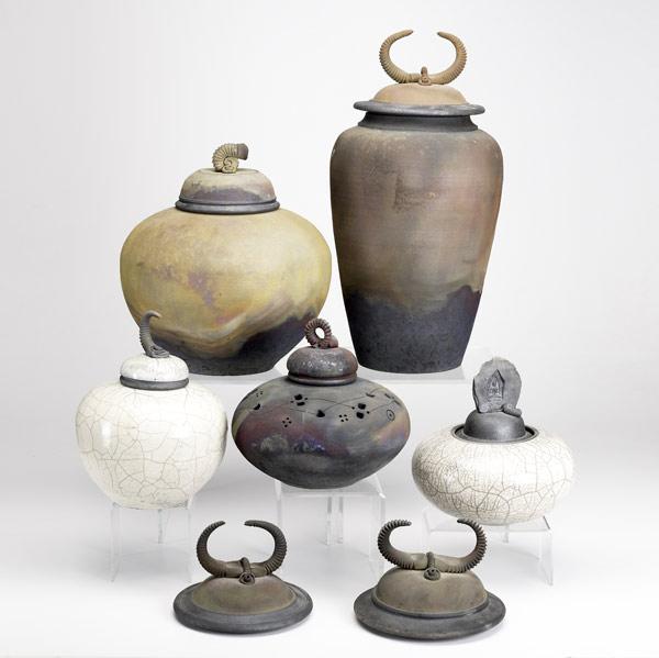 Appraisal: JAY GOGIN Seven pieces of totemic raku pottery include tall