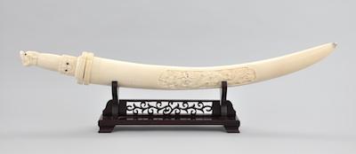 Appraisal: A Carved Ivory Sword Very unusual item the scabbard is