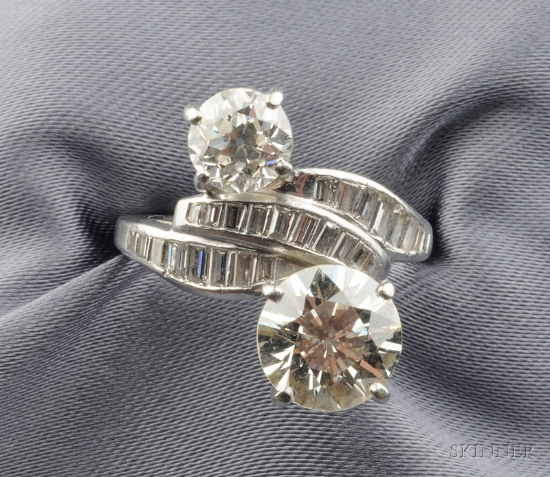 Appraisal: Platinum and Diamond Bypass Ring prong-set with an old European-cut