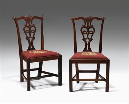 Appraisal: Pair of Chippendale carved mahogany side chairs Each with a