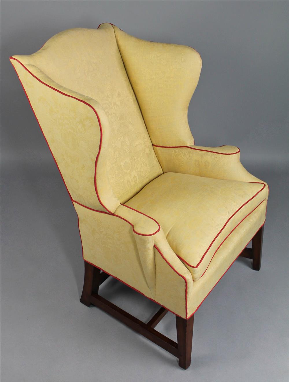 Appraisal: FEDERAL MAHOGANY UPHOLSTERED WING CHAIR COVERED IN YELLOW FABRIC having