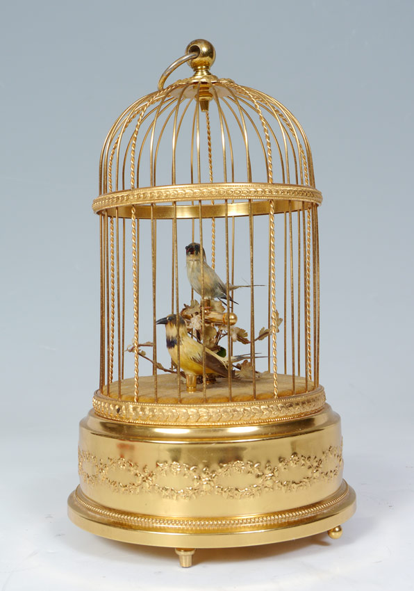 Appraisal: SWISS REUGE BIRD SINGING AUTOMATON Brass cage with singing birds