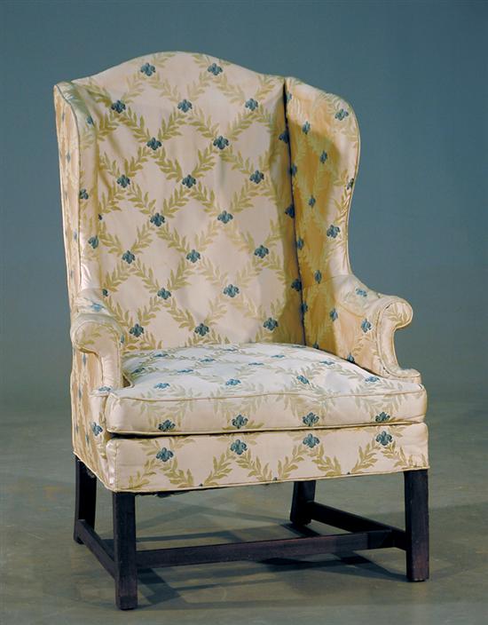 Appraisal: Chippendale style wingback chair late th century upholstered back and