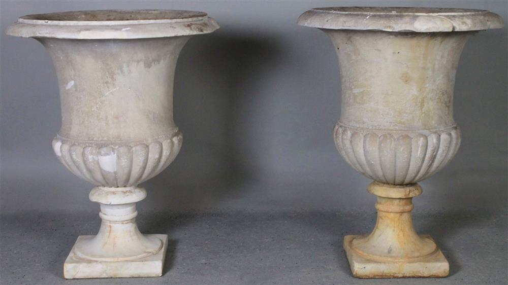 Appraisal: PAIR OF CLASSICAL STYLE CARVED CARRARA MARBLE URNS each of