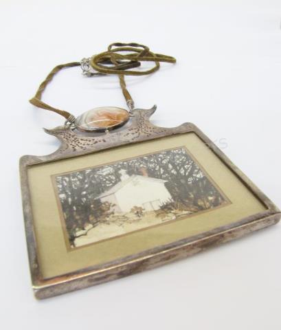 Appraisal: A vintage sterling silver photo frame pendant measuring x overall