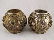 Appraisal: A pair of silver cased globe shaped candle holders depicting