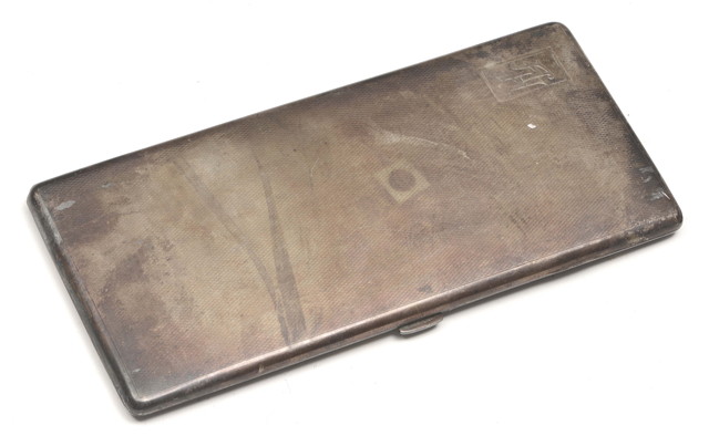 Appraisal: A STERLING SILVER RECTANGULAR CIGARETTE CASE with engine turned decoration