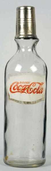 Appraisal: Coca-Cola Foil Label Syrup Bottle s Light soiling staining and