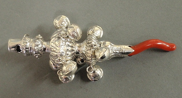 Appraisal: - English silver baby rattle with whistle and coral handle