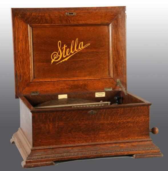 Appraisal: Stella Music Box Description Oak box Size - metal disc