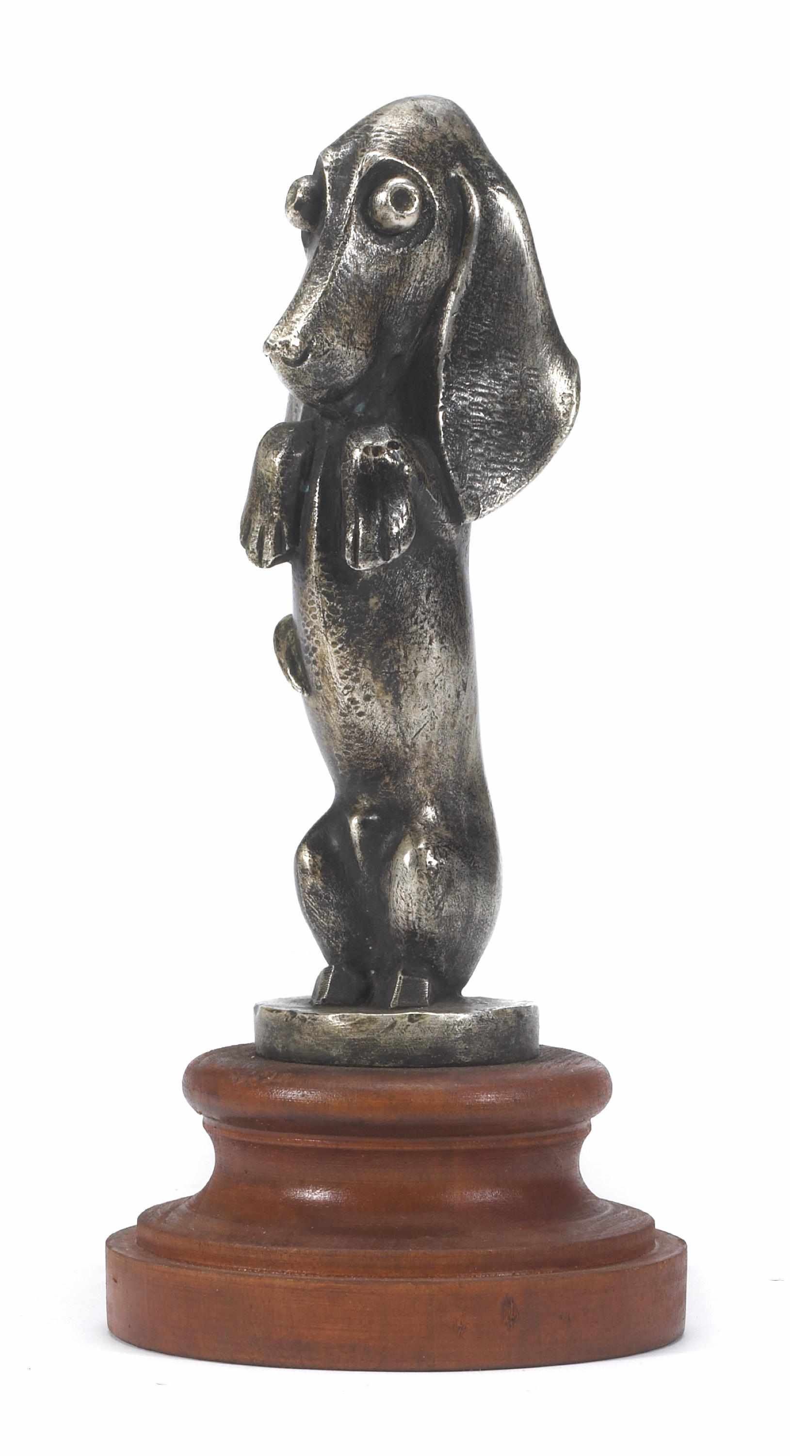 Appraisal: A 'Teckel' mascot after A Becquerel French silvered bronze a