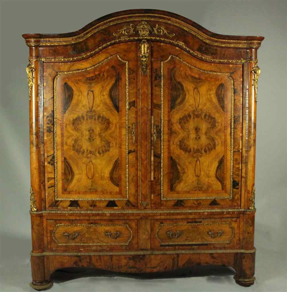 Appraisal: NAPOLEON III FRENCH WALNUT ARMOIRE WITH GILDED MOUNTS of walnut