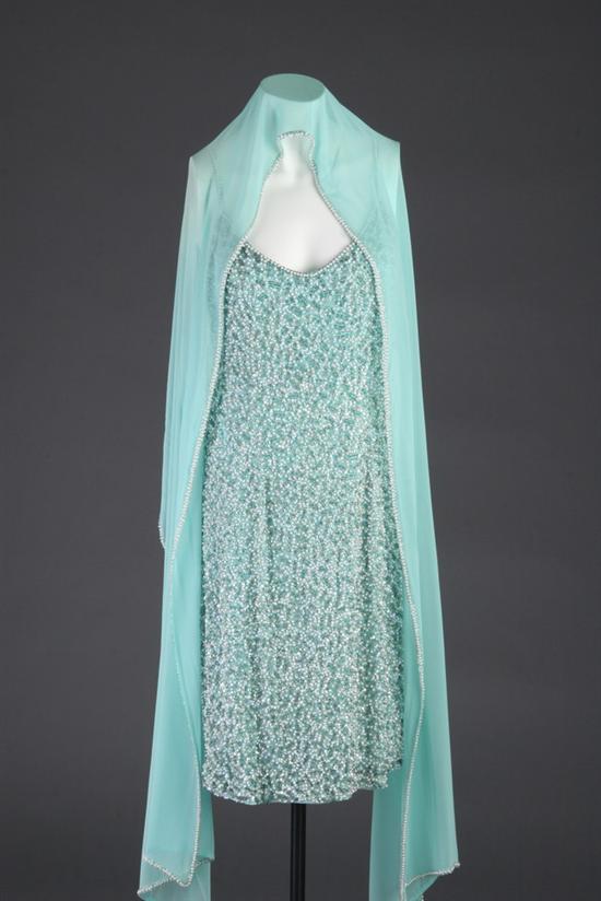 Appraisal: AQUA COLOR BEADED SILK EVENING DRESS Overall with silver bugle