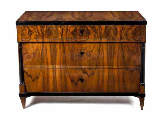 Appraisal: A Biedermeier Burlwood and Ebonized Commode having a rectangular top