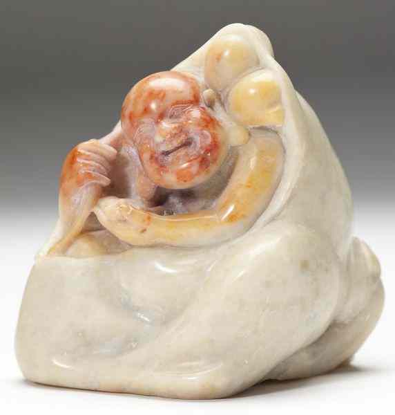 Appraisal: Chinese Soapstone Carvingcreamy colored stone carved in the form of