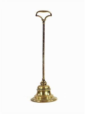 Appraisal: A Victorian brass doorstop the weight stamped for William Tonks