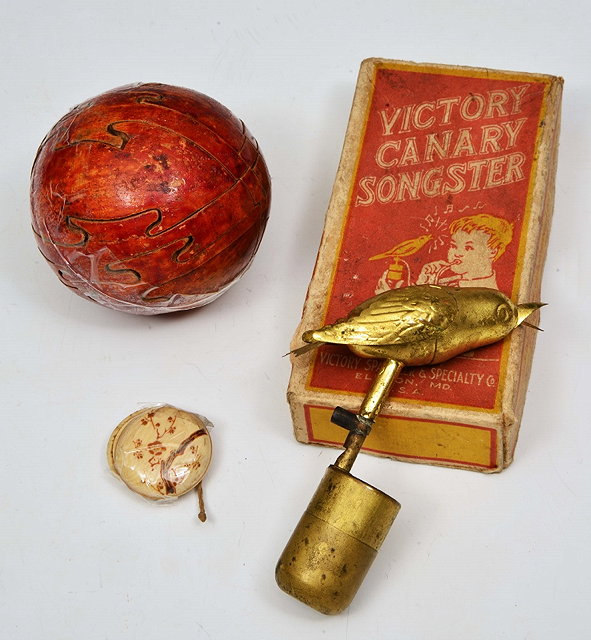 Appraisal: AN UNUSUAL VICTORIAN WOODEN PUZZLE CRICKET BALL a Victory Canary