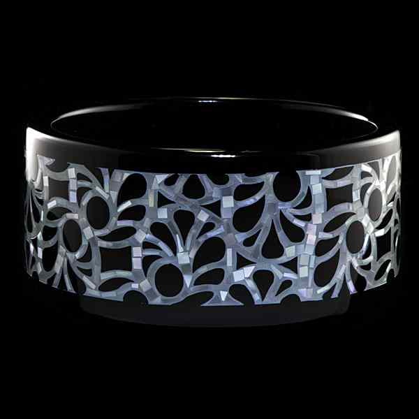 Appraisal: Ceramic and Mother-of-Pearl Bangle Wide black ceramic bangle with inlaid