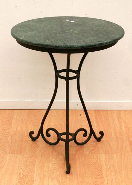 Appraisal: A th century serpentine marble topped wrought iron occasional table