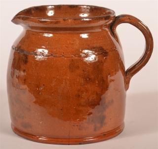 Appraisal: th C PA Redware Strap Handle Jar with Incised Chain