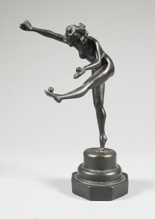 Appraisal: Period Art Deco cast statue of nude girl playing with