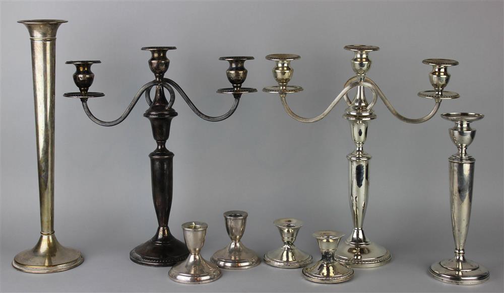 Appraisal: SEVEN AMERICAN SILVER CANDLESTICKS all with weighted bases including one