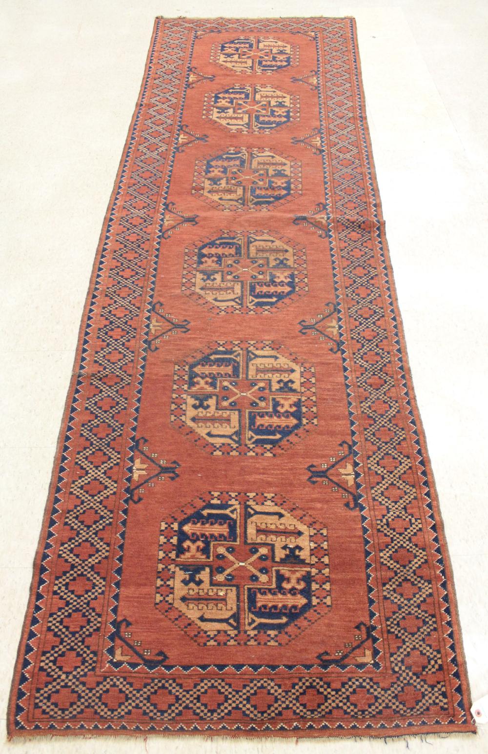 Appraisal: SEMI-ANTIQUE AFGHAN ERSARI TURKMEN RUNNER having a column of six