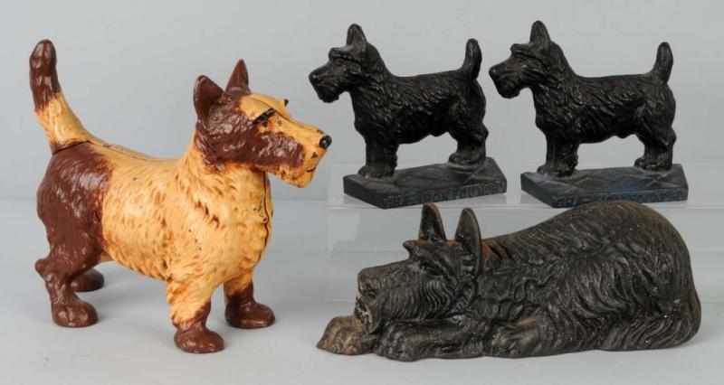 Appraisal: Lot of Cast Iron Scottie Doorstops Bookends Description Standing Scottie