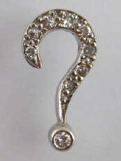 Appraisal: A diamond collar stud designed as a question mark approx