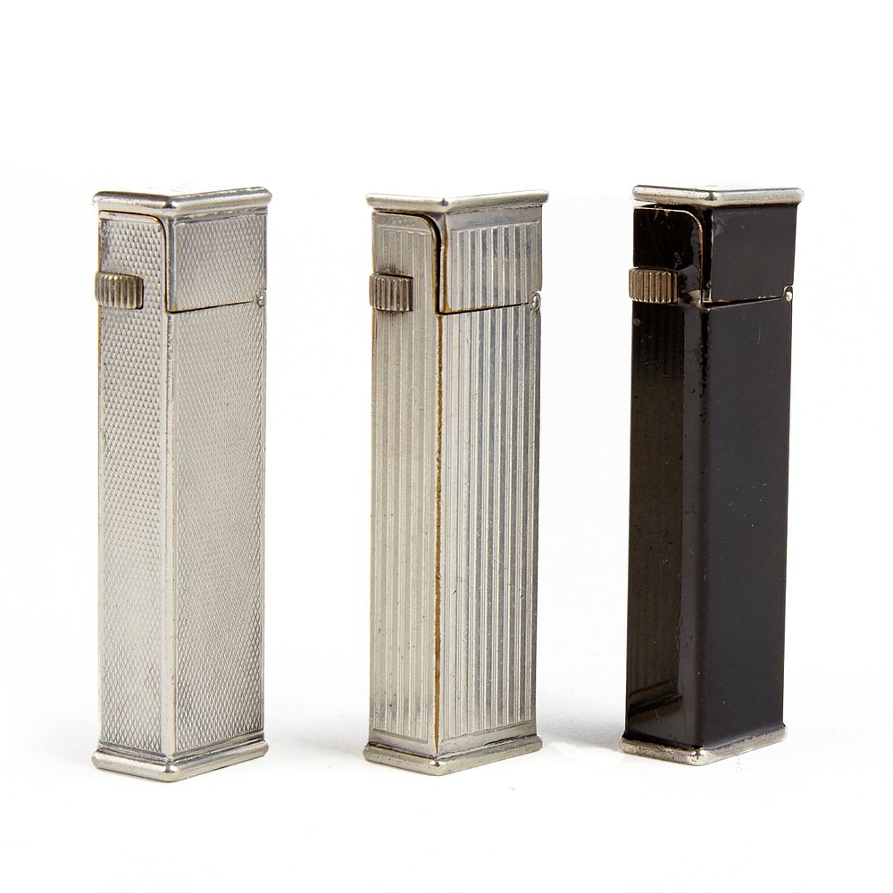 Appraisal: Grp Dunhill Cartier Licensed Tallboy Lighters Dunhill United Kingdom Three