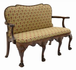 Appraisal: A CHIPPENDALE STYLE CARVED MAHOGANY SETTEE A CHIPPENDALE STYLE CARVED