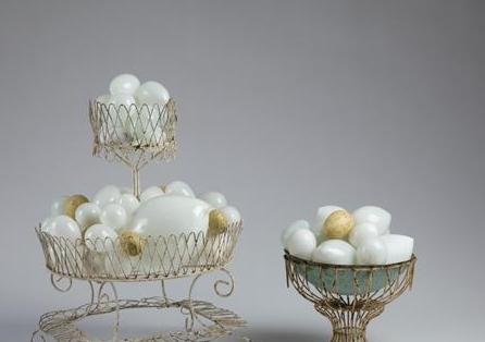 Appraisal: TWO WIREWORK BASKETS EACH FILLED WITH A BOUNTIFUL ARRANGEMENT OF