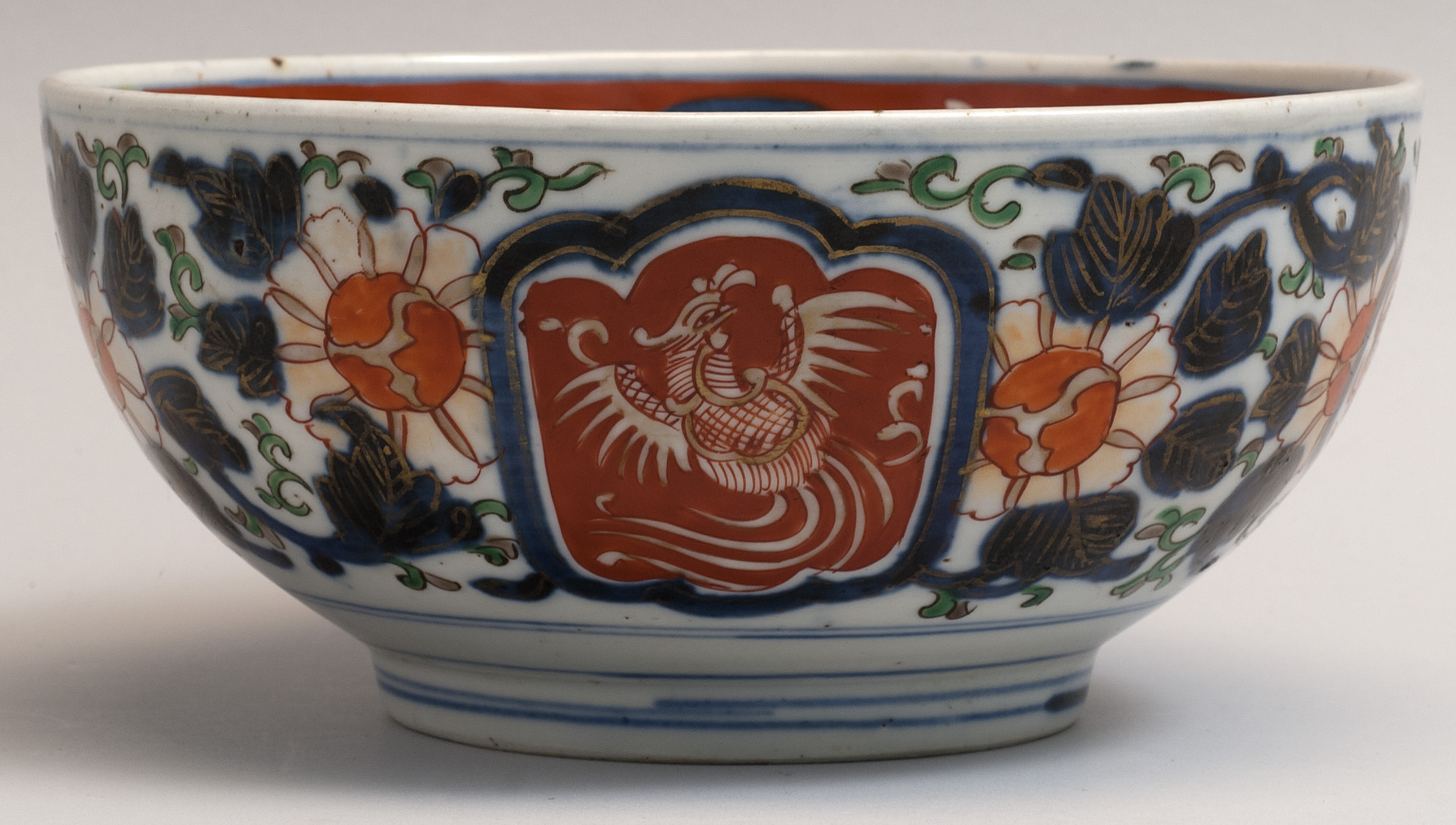 Appraisal: IMARI PORCELAIN BOWL Meiji PeriodInterior with phoenix decoration and chrysanthemum