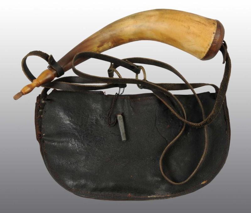 Appraisal: J Fox Powder Horn Description Includes black leather pouch Condition