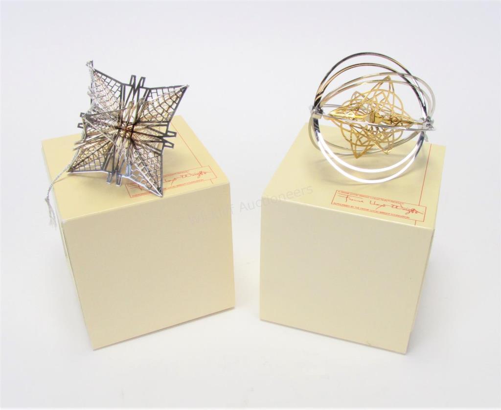 Appraisal: Two Frank Lloyd Wright ornaments one with a spherical silver