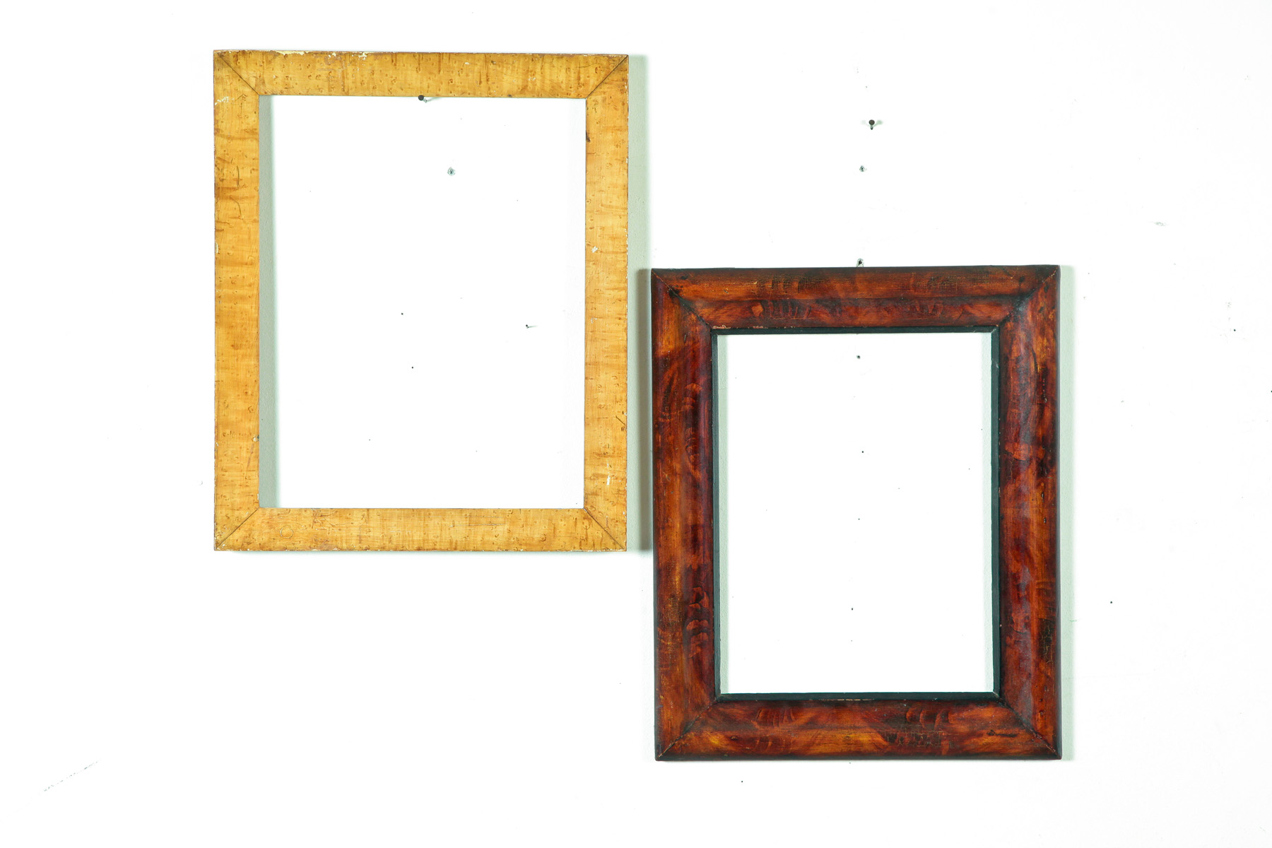 Appraisal: TWO DECORATED AMERICAN FRAMES Mid th century Faux bird's-eye x