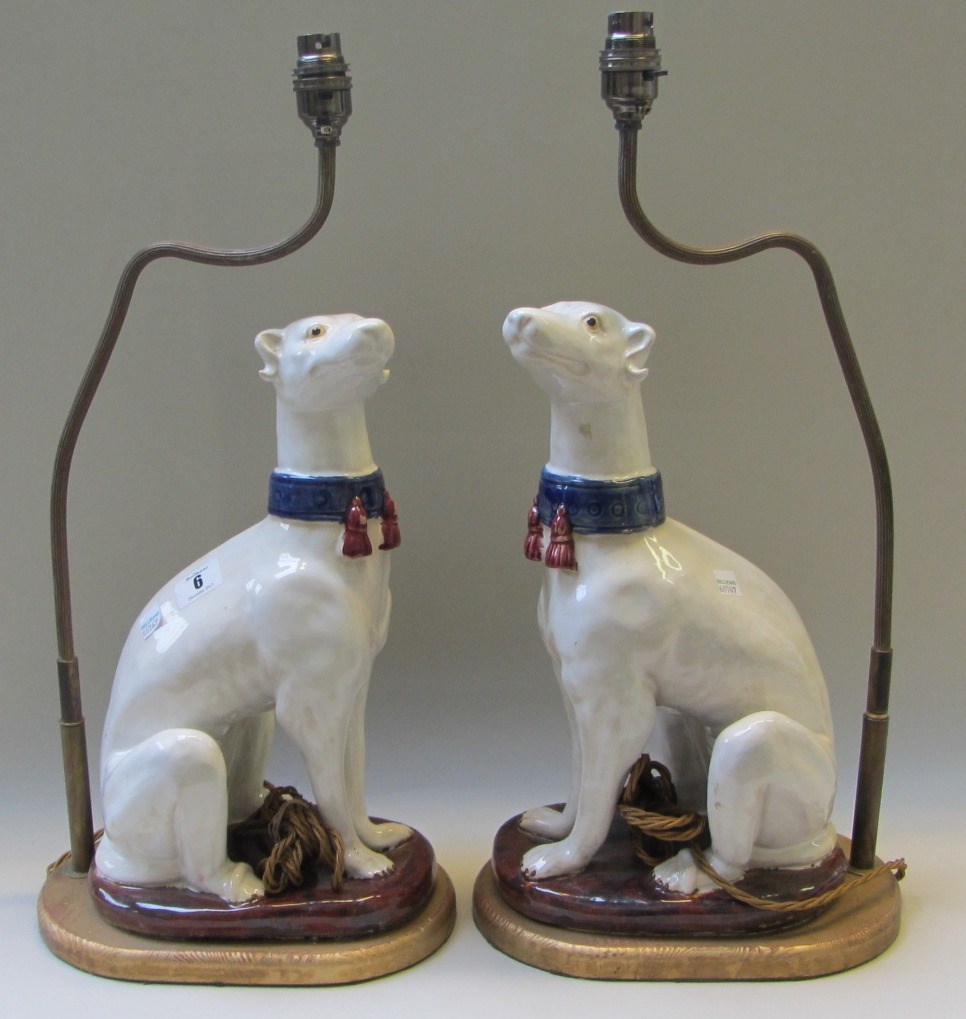 Appraisal: A pair of Continental faience models of greyhounds early th