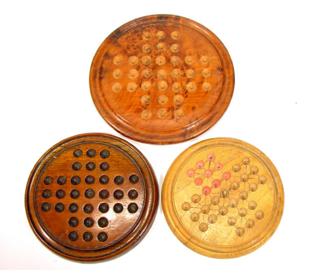 Appraisal: Three circular wooden solitaire boards the largest cm diameter