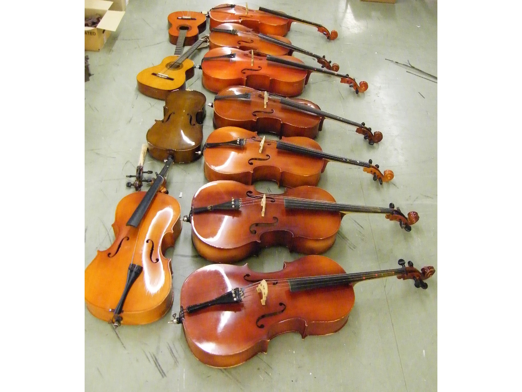 Appraisal: Nine various student grade violoncellos six cased together with two