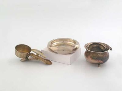 Appraisal: Three smoking related items a pipe or cigar rest with