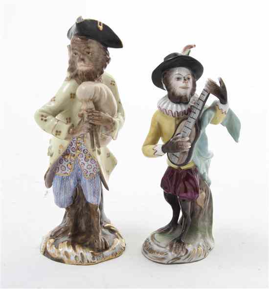 Appraisal: Two Continental Porcelain Figures each depicting a monkey with an