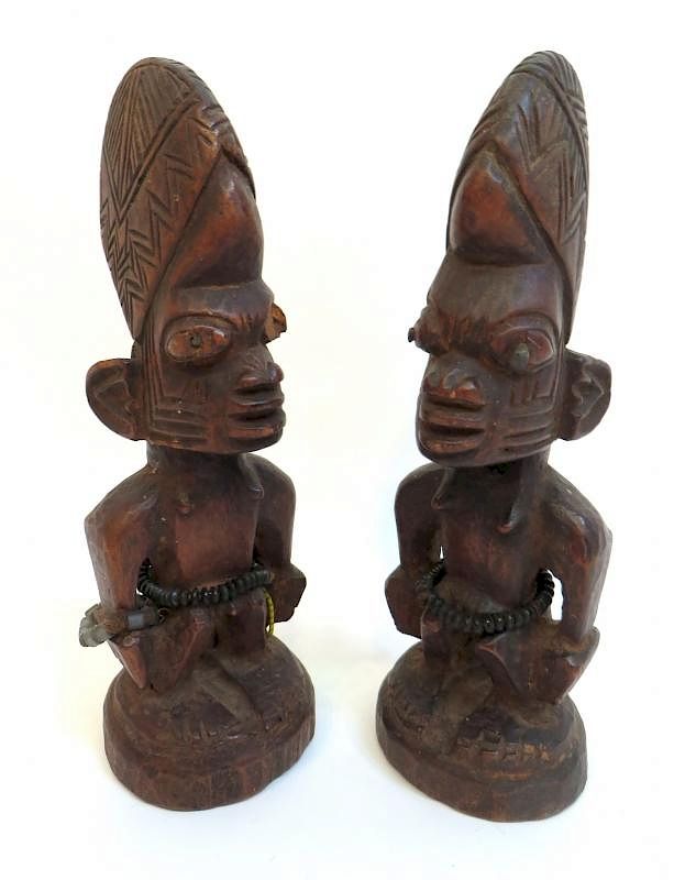 Appraisal: African Carvings Male Female African Carvings Male Female Description Two