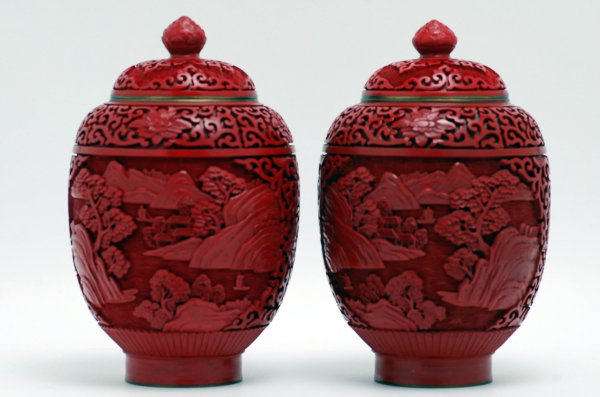 Appraisal: DESCIRPTION Two cinnabar ginger jars of cinnabar over brass with