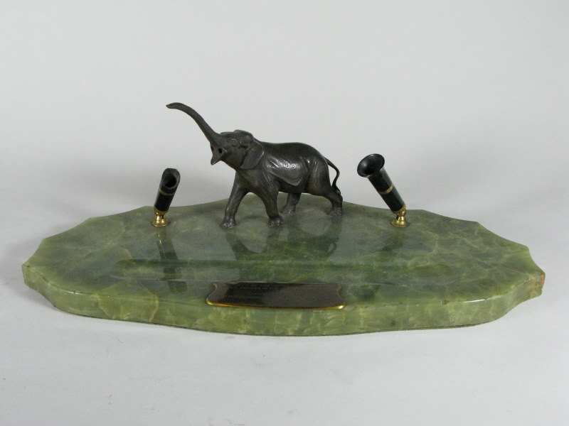 Appraisal: Bronze Elephant Desk Set on asymmetrical green marble platform base