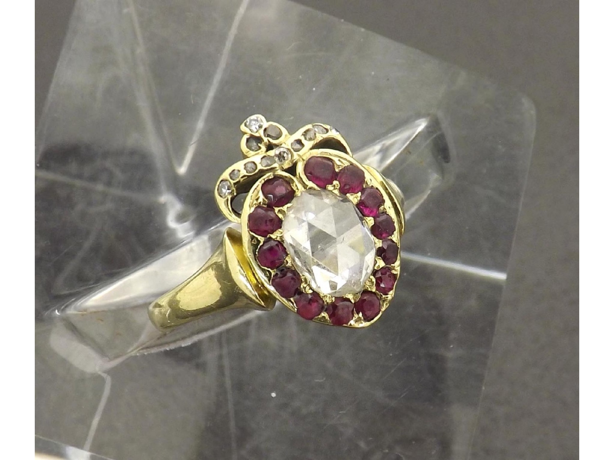 Appraisal: Antique rose-cut diamond and ruby heart design ring in yellow